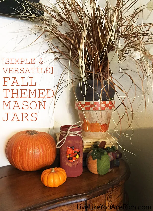 These simple 'Fall Themed Mason Jars' are a great way to add a little festivity to your home. They are great for Halloween and Thanksgiving and are inexpensive to make!