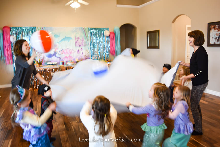 Beach ball parachute game under the sea party