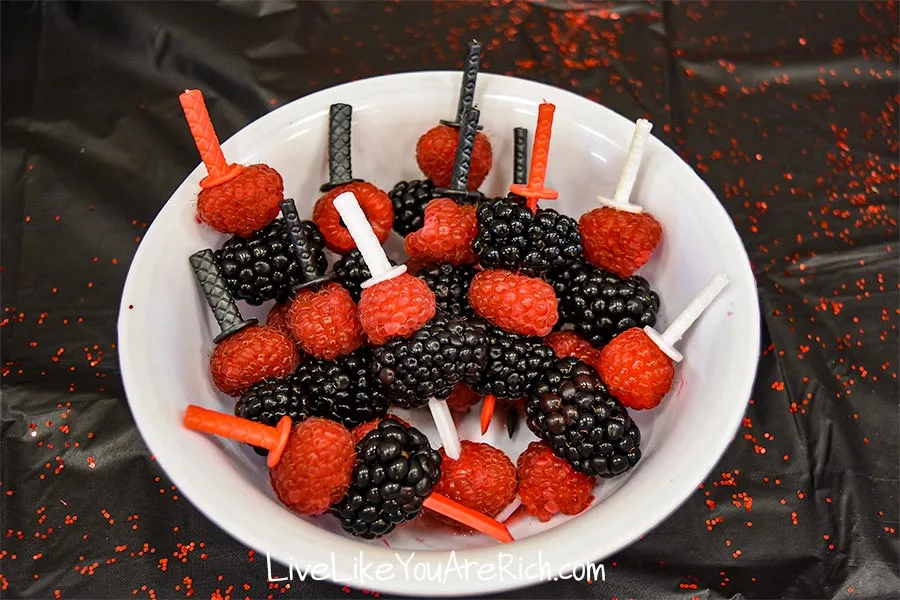 nInja toothpicks with raspberries and blackberries