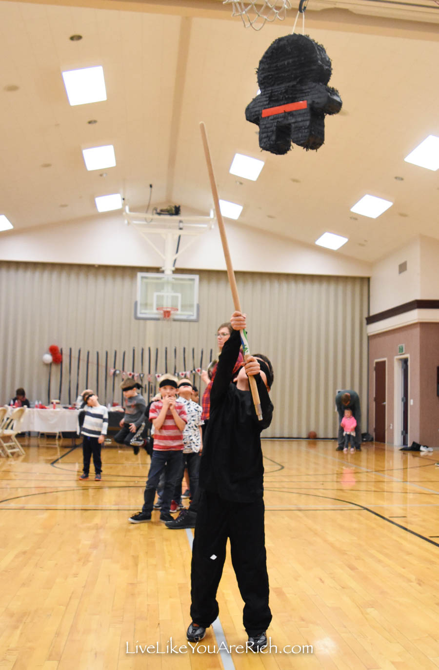 hitting a ninja pinata