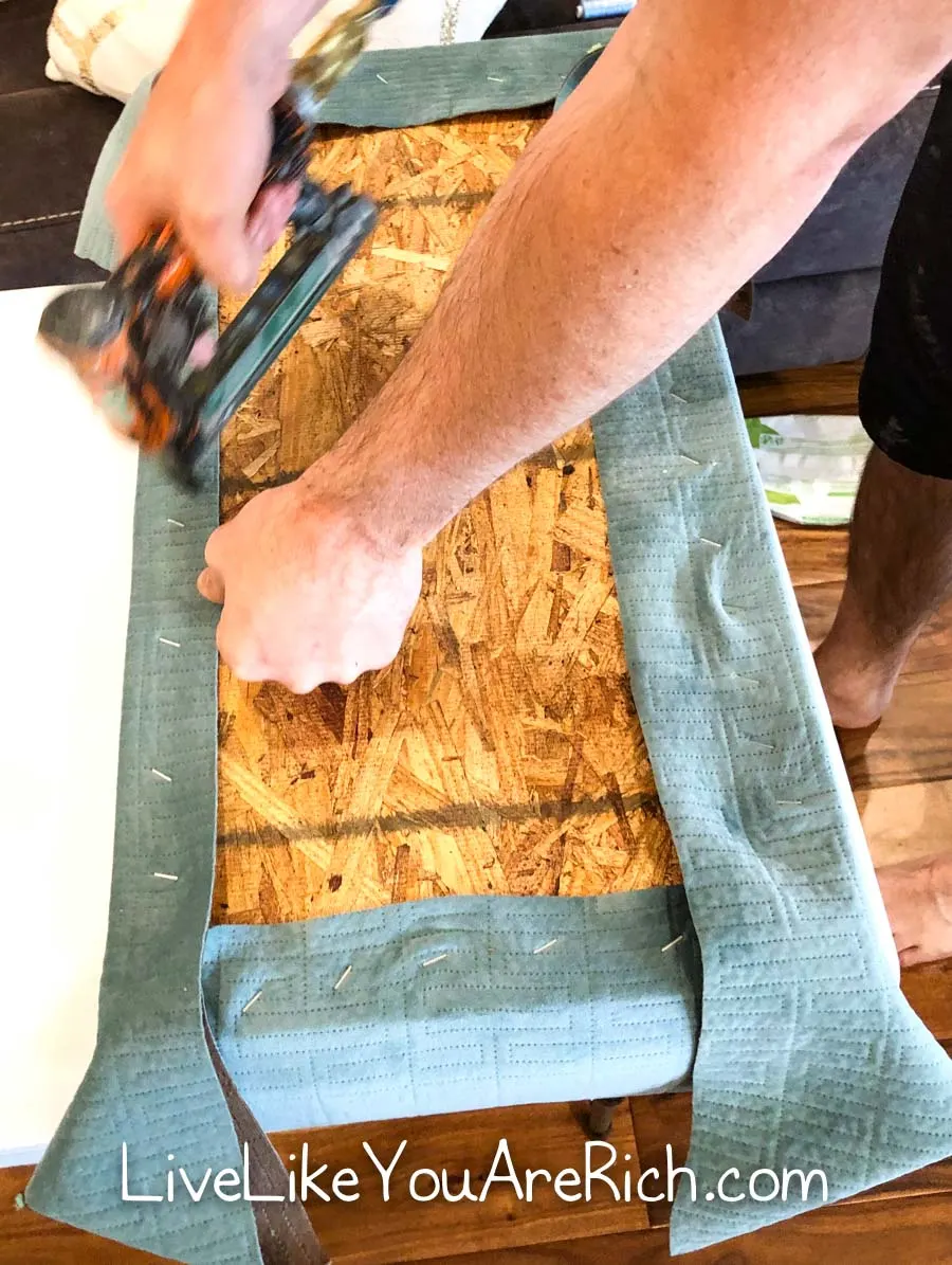 stapling fabric to bench seat