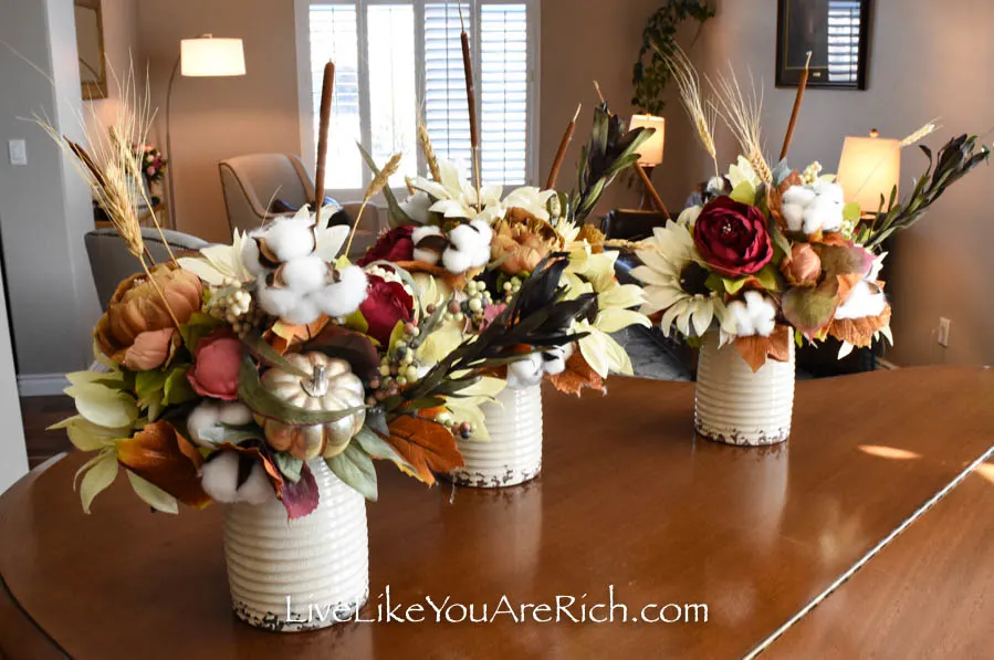 These artificial Fall flower arrangements are great for home decor.