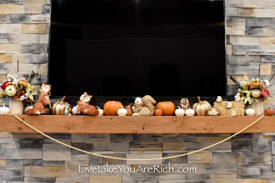 This Harvest Mantel Thanksgiving Decor is easy to put together.