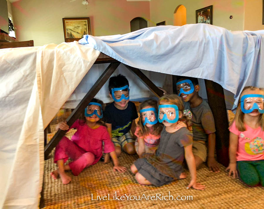 Kids wearing scuba diving mask.