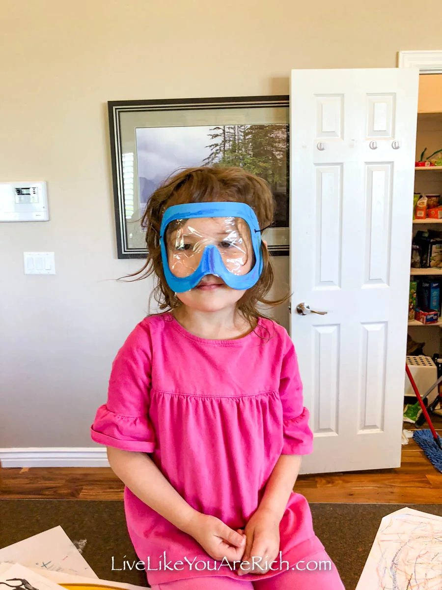 Aurora wearing her scuba diving mask.