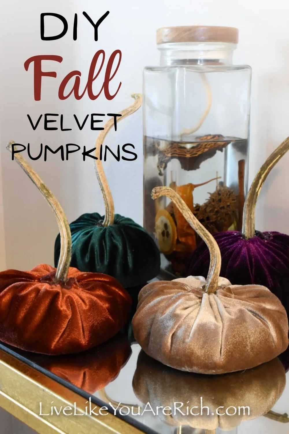 Looking for fun craft to make with your kids? These DIY Fall velvet pumpkins are inexpensive and simple to make. My six year old daughter and I put them together in less than 45 minutes. This would make such a group craft and also a fun craft to make with kids. #fall #fallcraft #pumpkin