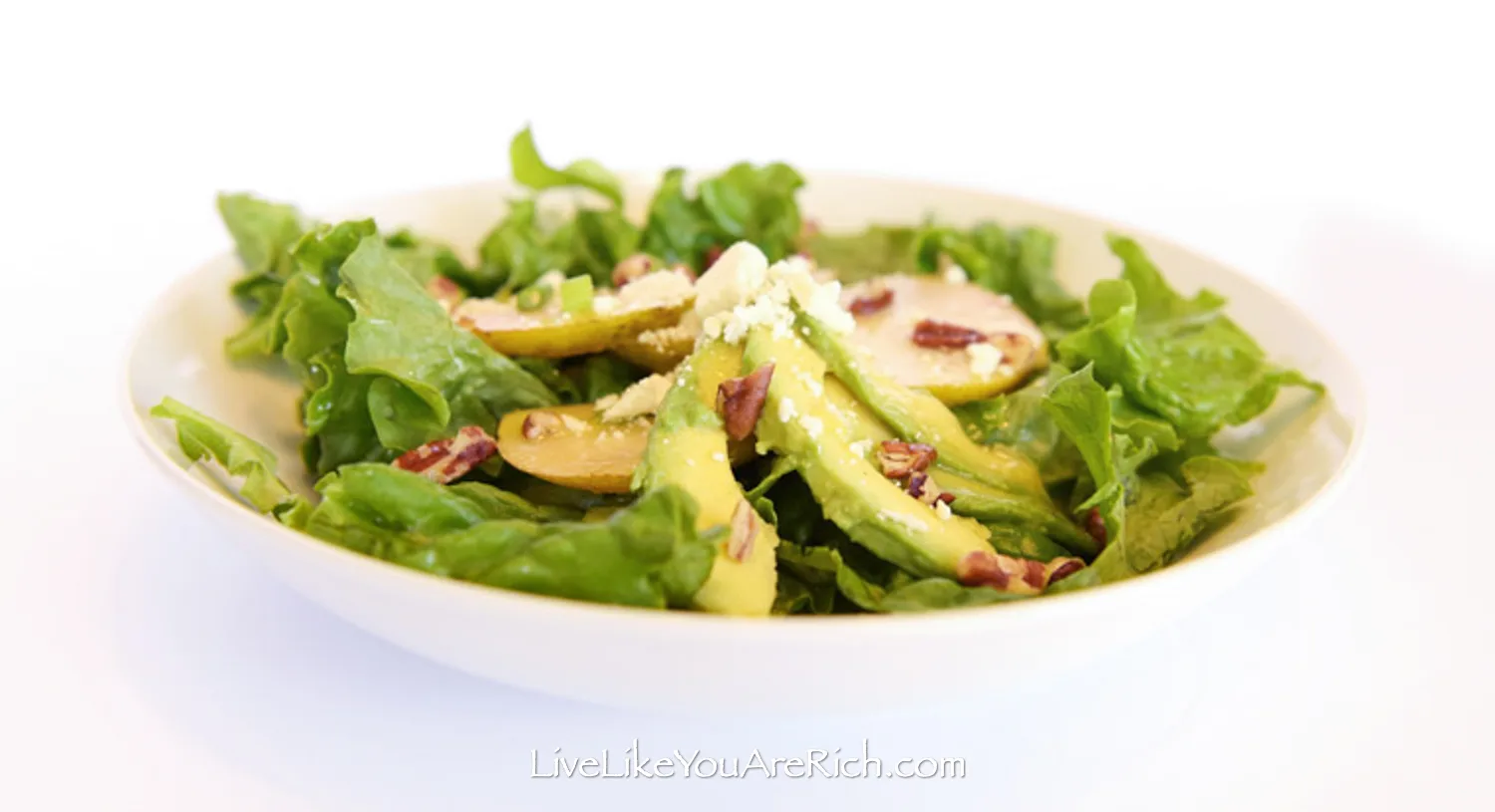 Pear Avocado Salad With Feta Cheese in bowl