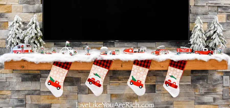Red Truck Christmas decorations under fireplace