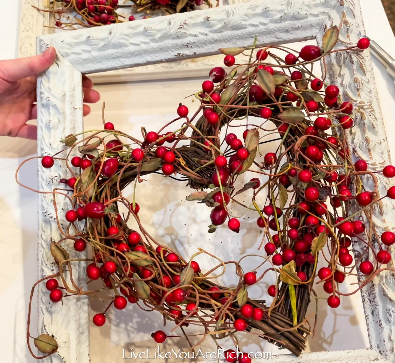 Berry Heart Wreath in a Vintage Frame on display