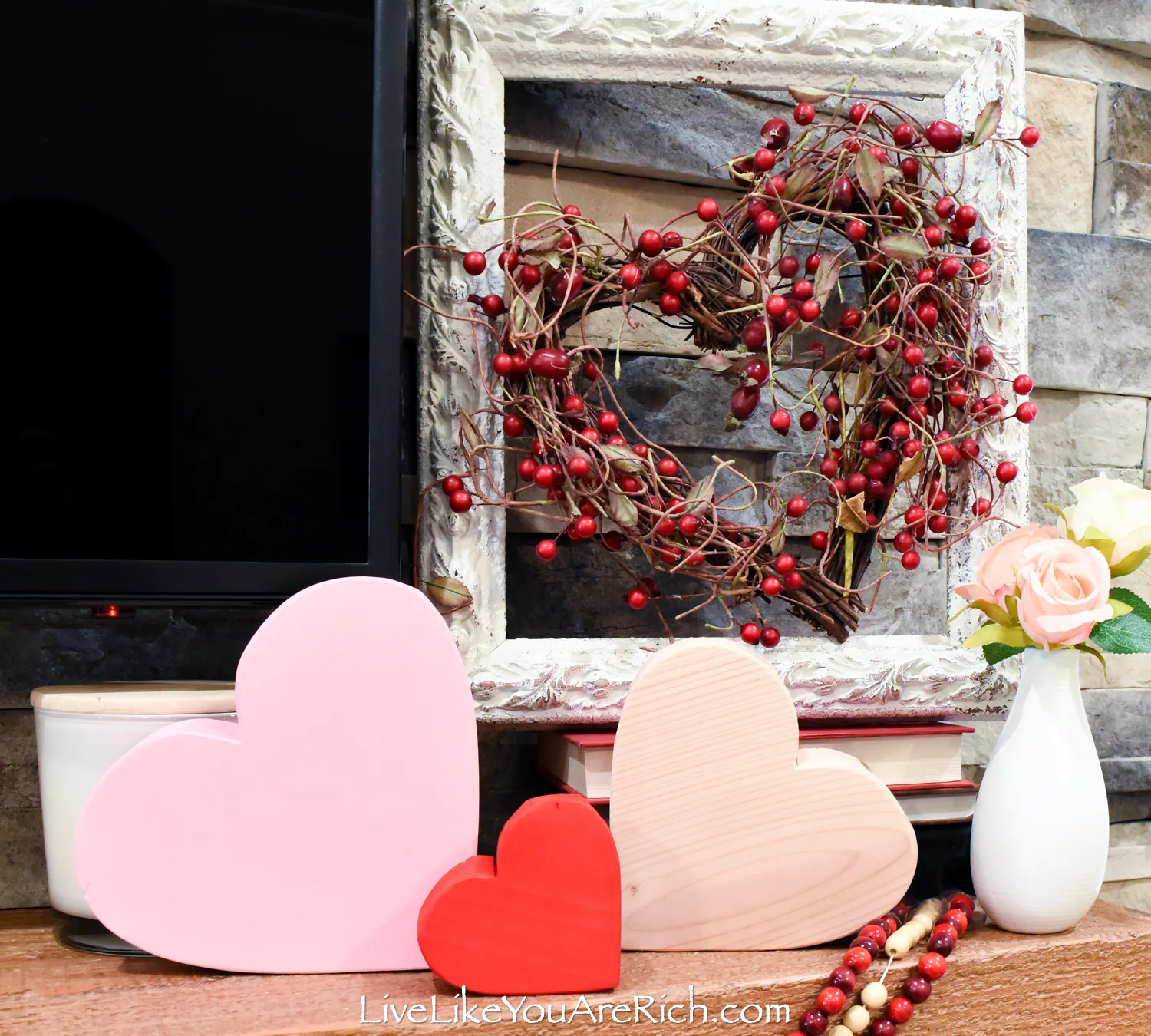 Painted wood heart shape and framed wreath