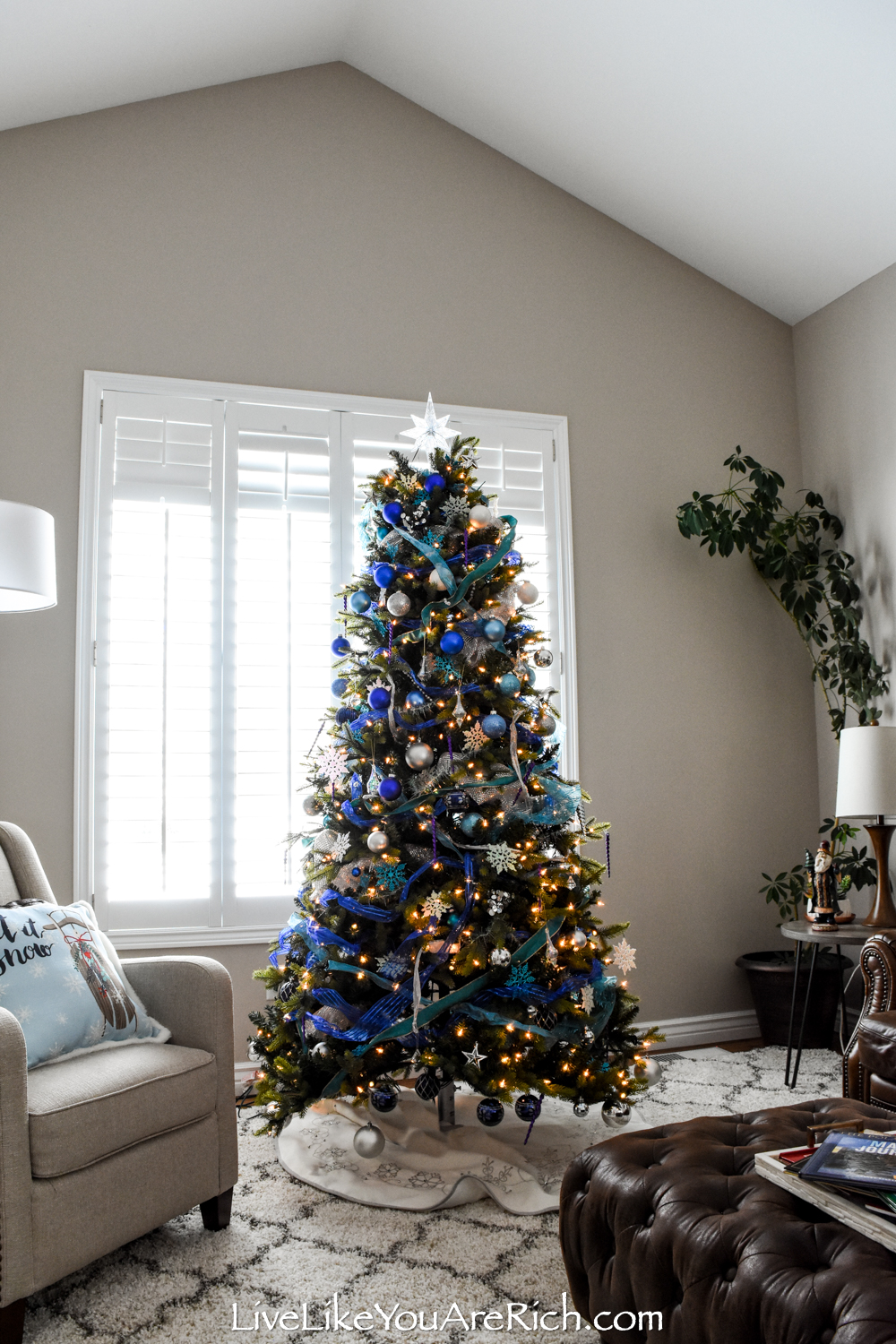 Pre lit white christmas deals tree with blue lights