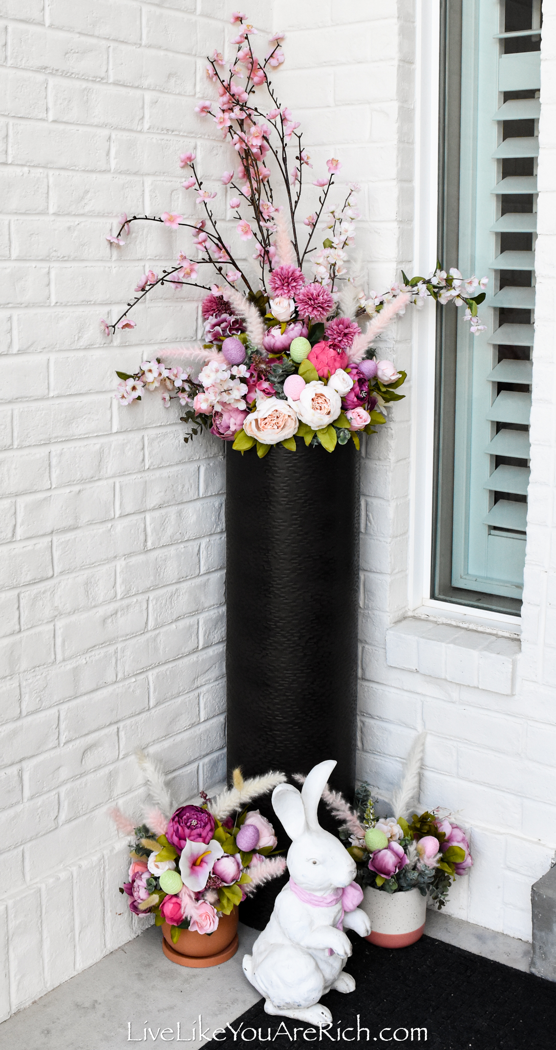Easter Floral Front Door Decor filled with flower and eggs
