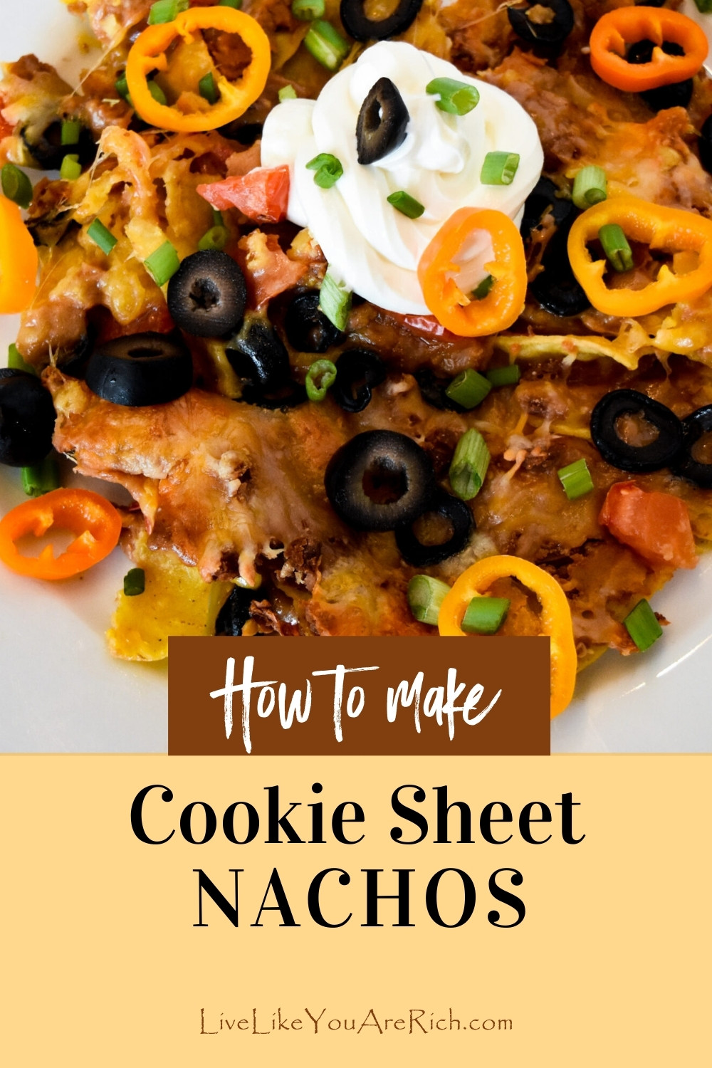 This is a cookie sheet oven baked nacho recipe that is completely customizable for friends and family.