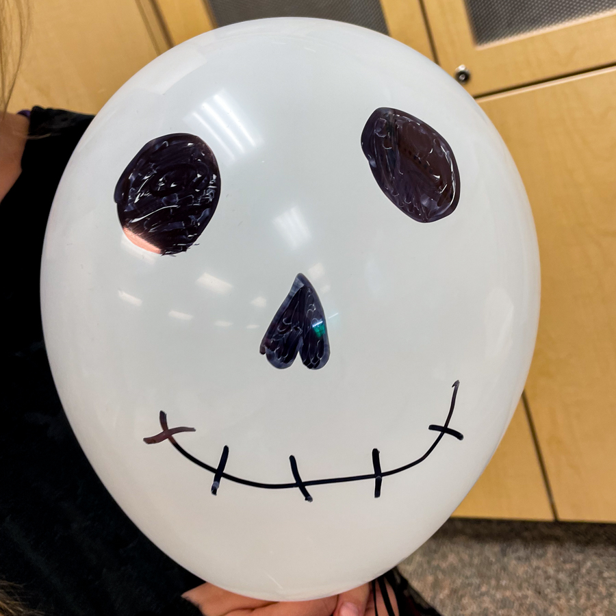 Draw faces on balloons with sharpie!!!!