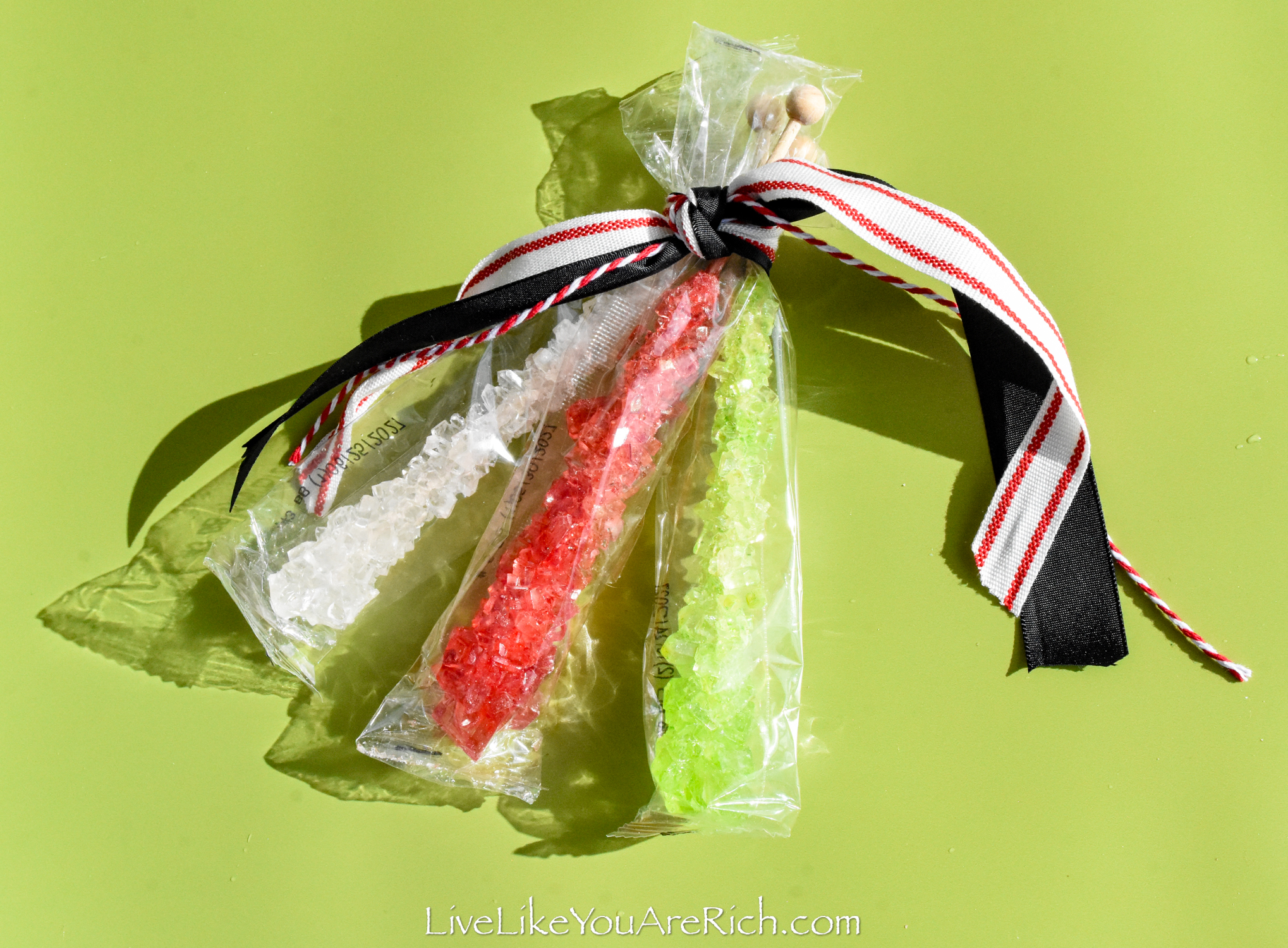 https://livelikeyouarerich.com/wp-content/uploads/2023/11/Neighbor-Christmas-Gift-Rock-Candy-Suckers-4.jpg