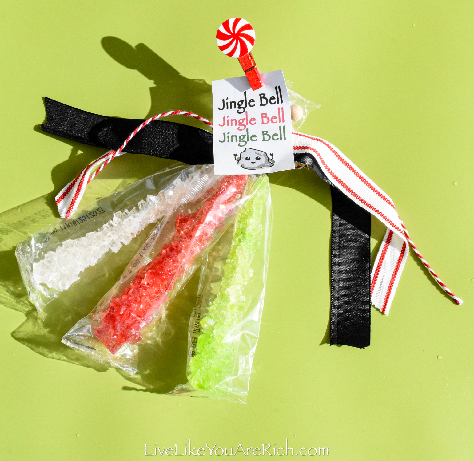 https://livelikeyouarerich.com/wp-content/uploads/2023/11/Neighbor-Christmas-Gift-Rock-Candy-Suckers-5.jpg
